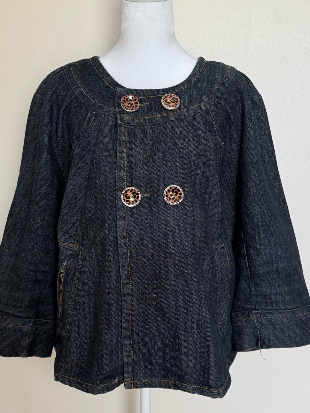 Parisian chic Ashley Stewart dark wash denim jacket with leopard print buttons